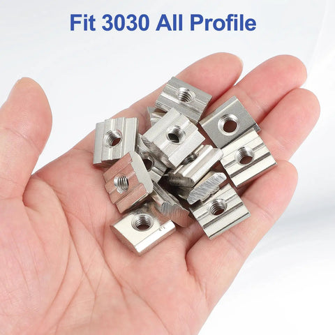 Hand holding M6 Sliding T Nuts For 3030 Aluminum Extrusion 30 Pieces Hammer Head Drop In Nuts 8 mm European Standard Carbon Steel