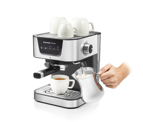 Heavy Hitter 19 Bar Manual Espresso Machine With Integrated Milk Frother Dual Outlet Arms And Heated Base brewing espresso and frothing milk.