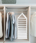 Hella Roomy White PVC Closet Hanging Storage Bag Featuring Nine Spacious Compartments To Keep Your Daily Threads And Weekend Fits Bangin And Fully Organized in a closet.