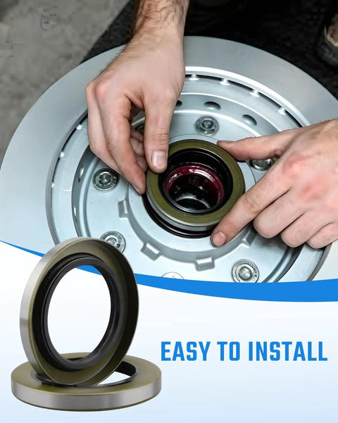 Person installing Double Lip Grease Seal Kit Heavy Duty For 5200 7000 Lb RV Trailer Axles Two And A Quarter Inch Inner Diameter