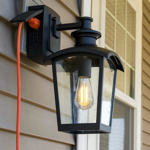 Outdoor Wall Lantern featuring Go-To Outdoor Wall Lantern 1 Light With Seeded Glass And Built In GFCI Outlet Black Finish on house siding