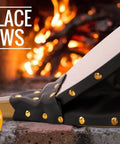 Top Shelf Wooden Fireplace Bellows With Heavy Leather Strap Brown Air Blower Pump For Campfires Barbecue close-up view by fire.