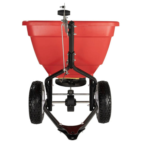 Front view of Tow Behind 150Lb Broadcast Spreader For Fertilizer And Seed With Easy Flow Control Adjustable Settings Non Skid Tires