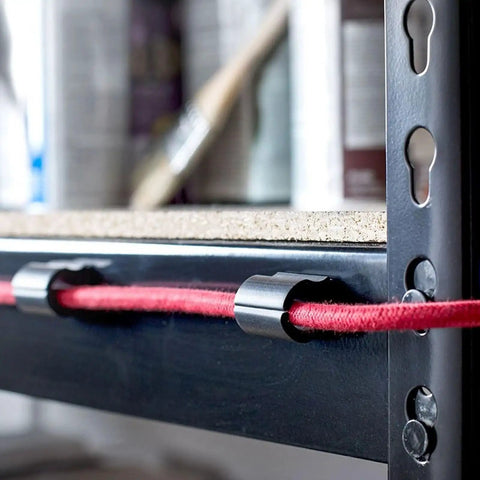 D Wings Cord Clips Nail Free Cable Organizer Kit Black Assorted Size Set Of 18 holding red cable against metal frame