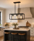 Black Industrial Kitchen Island Light With 3 Light Linear Cage Chandelier over modern farmhouse island