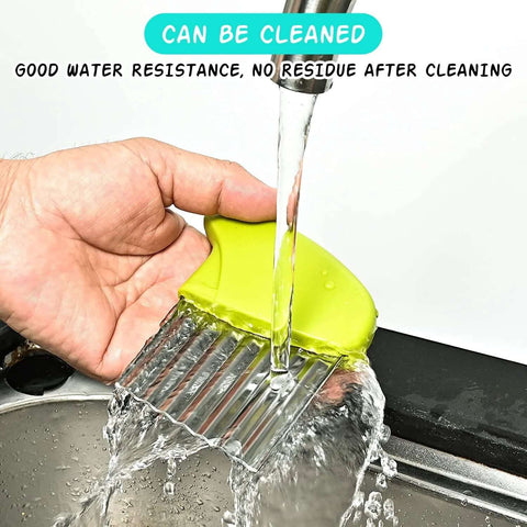 Close-up of green plastic-handle crinkle cutter with stainless steel ridged blade under running water.
