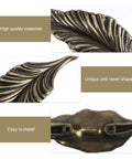 Close-up of Antique Zinc Alloy Leaf Cabinet Handle Set with detailed leaf design and texture, showing high-quality vintage style