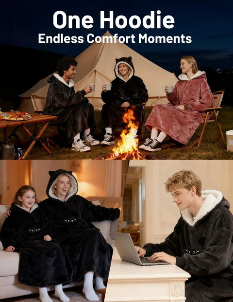 Adults wearing Wearable Blanket Hoodie For Adults With Flannel And Sherpa Lining, Extra Long Knee Length, Giant Pocket, at campfire and home.
