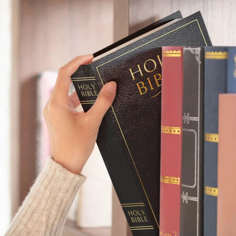 Hand reaching for Hidden Bible Safe Box With Combination Lock For Discreet Stash Large Diversion Safe Book That Looks Real