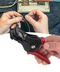 Heavy Duty Adjustable Wire Stripper Tool With Comfortable Grip designed for electricians stripping cables with hands on wires.