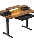 Chill 47 Inch Electric Standing Desk With Glowing RGB LED Gaming Table Features Memory Height Settings For Customizable Home Office Or Battle Station Setup with wooden surface and drawers