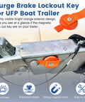 Front view of orange magnetic surge brake lockout key with strap, 2-pack for boat trailer surge brakes
