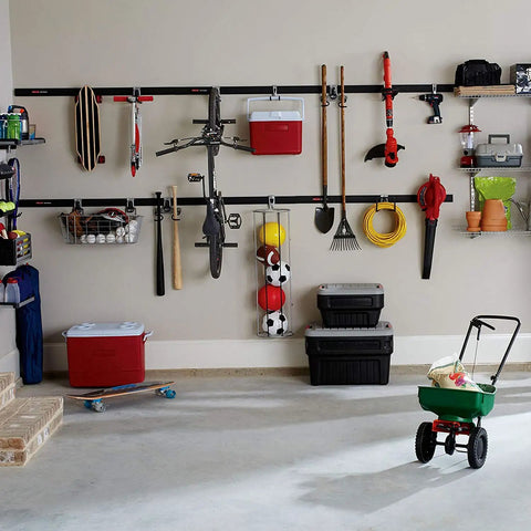 Must Have FastTrack Garage Hook Set 6 Pack Heavy Duty Powder Coated Metal Hangers For Ladders Tools Ropes Hoses Bikes And More Installs On Rails Easily Holds Up To 25 Lbs Each, various garage tools organized on hooks and shelves on wall.