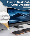 Game Changer 8 Piece Bundle White Desk Grommet Kit Featuring Detachable Cable Hole Cover And Heavy Duty Bi Metal Drill Bit For Hassle Free Cord Routing And A Top Tier Home Office Makeover, showing white plastic desk cable organizer with removable cover.