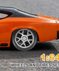 8 Piece 1 64th Scale Wheels And Tires Set With Real Riders Rims on orange diecast car showcasing silver rims