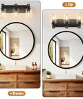 Give Your Mirror Space A Major Glow Up With This Three Bulb Bathroom Vanity Light In Matte Black And Raw Wood Grain Secured By Rock Solid Steel Mounts For Straight Up Rustic Charm displayed above a circular mirror.