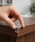 Hand installing Four Pack PVC Corner Guards for Furniture and Tables, No Tools Needed, Easy Install Edge Protectors, clear on table edge
