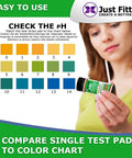 Person using Alkaline Water pH Test Strips Kit for Home Use, holding strip with color chart for water testing.