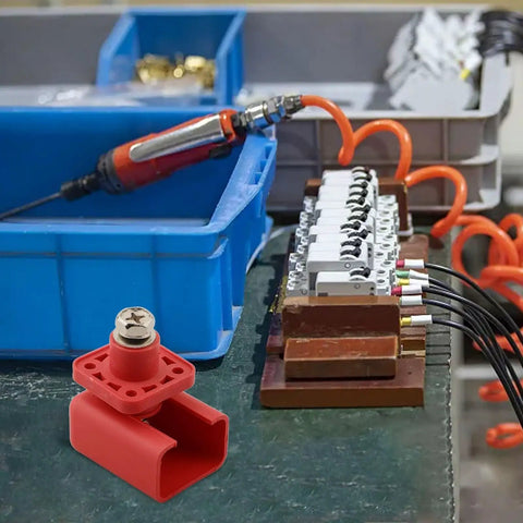 Tough As Nails 200 Amp Lithium Terminal Connector With Threaded Wiring and High Voltage Power Adapter For EV Battery Packs Red pure copper connector on workbench.