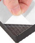 Peeling off backing from Tough PE Foam Garage Wall Protectors For Cars Thick Peel And Stick Door Bumper Guards Auto Impact Absorbing Pad.