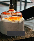 Glassblowing process with molten glass on graphite block, highlighting Three Piece Graphite Block Ingot Plates For Melting And Casting In Vacuum Furnaces, Electrolysis And Electroplating, Pro Grade Heavy Duty High Temperature Graphite Electrode Sheets, 20x5 cm Ingot Rectangle Insulation Board Set.