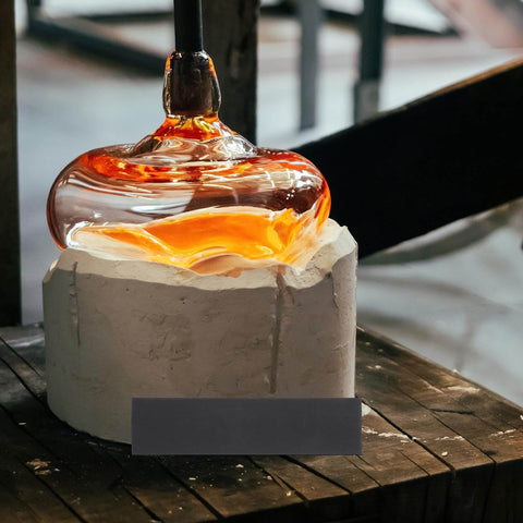 Glassblowing process with molten glass on graphite block, highlighting Three Piece Graphite Block Ingot Plates For Melting And Casting In Vacuum Furnaces, Electrolysis And Electroplating, Pro Grade Heavy Duty High Temperature Graphite Electrode Sheets, 20x5 cm Ingot Rectangle Insulation Board Set.