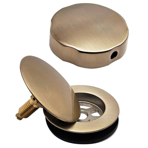 Top Shelf 35 Inch Cable Driven Bath Drain Trim Kit With Rotary Overflow Cover And Smooth Pop Up Stopper Featuring Schedule 40 PVC Construction And Slick Champagne Bronze Finish - Close up of cover and strainer.