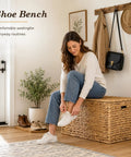 Handwoven Water Hyacinth Storage Trunk With Lid And Handles used as a shoe bench in entryway