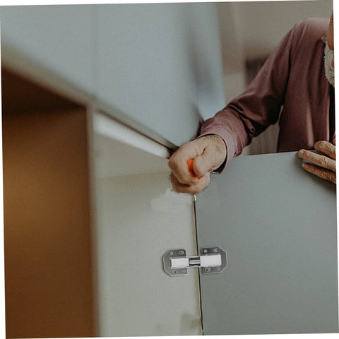 FOYTOKI wardrobe hinge repair kit, silver metal hinge being installed on a cabinet door