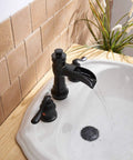 Matte Black 3 Hole Widespread Bathroom Faucet With Two Handles 8 Inch Centers Waterfall Spout in farmhouse style setup