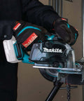 Person using 18V LXT Cordless Metal Cutting Saw Bare Tool With 5 3 8 Inch Cut Capacity, Up To 2 Inch Cutting Depth, 3,600 RPM on metal pipe