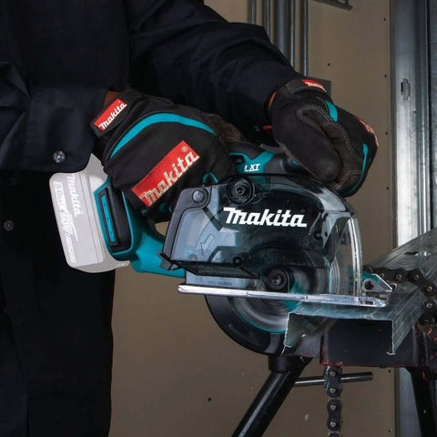 Person using 18V LXT Cordless Metal Cutting Saw Bare Tool With 5 3 8 Inch Cut Capacity, Up To 2 Inch Cutting Depth, 3,600 RPM on metal pipe