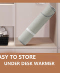 Rolled under desk foot warmer portable personal electric panel heater for office storage demonstration.