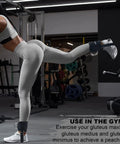 Woman using Adjustable Ankle Straps for Cable Machines Built For Kickbacks and Glute Workouts in gym setting