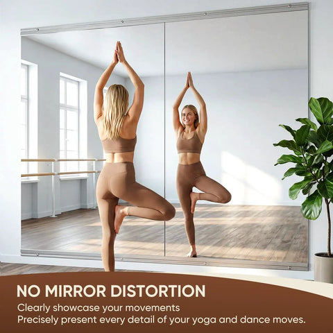 Woman practicing yoga in front of two piece full body mirrors 48 by 24 inches frameless tempered glass wall mounted for home gym
