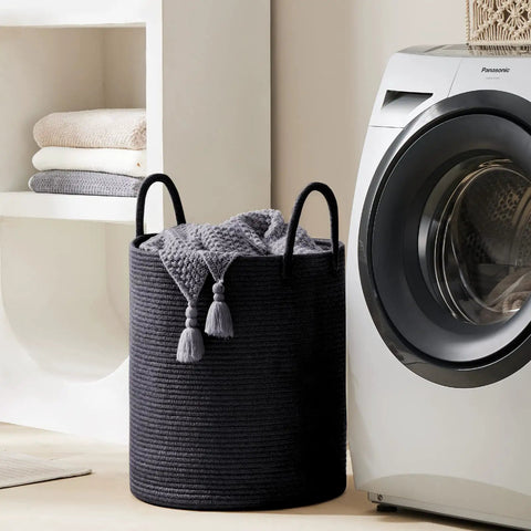 Dope Eco Friendly Tall Rope Laundry Hamper Made From Natural Cotton Rope 72L Large Laundry Basket next to washing machine