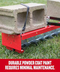 36-Inch Tow-Behind Spike Aerator with 9 galvanized disks, red steel frame, weight tray with cinder blocks, on grass