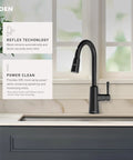 Pulldown Kitchen Faucet With Power Clean Spray And Reflex Docking System For Easy Docking, Smooth Operation, And Powerful Cleaning, One Handle Modern Sink Faucet 7402C in black finish, installed in a modern kitchen setting.