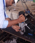User operating a German Made Portable Magnetic Drill Press With Dual Speed Controls And A Beefy 9.5 Amp Motor That Smashes Through Heavy Steel Plate Jobsite Ready Compact Frame Saves Your Lower Back From Taking A Beating.
