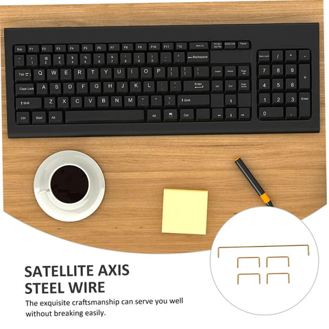 Premium Gold Plated Satellite Stabilizer Wires For Mechanical Keyboards on a desk with coffee and notes.