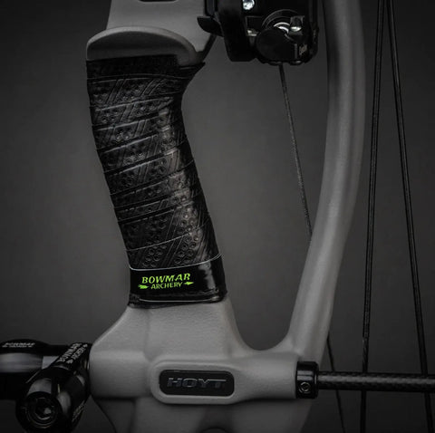 Close-up of Archery Grip Tape Version 2 Pro on a bow, showing black textured wrap for steady grip in wet or dry conditions.