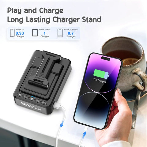 Foldable Phone Stand With Bluetooth Speaker And Built In Charging Station 3 In 1 Desk Gadget next to phone showing charge status