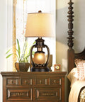 Rustic Lantern Table Lamp For Living Room And Bedroom End Table With Oatmeal Tapered Drum Shade, Built In USB Ports And AC Outlet on nightstand