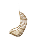 Side view of Mariah Wicker Hanging Chair With Cushion For Indoor Outdoor Chill Lounger, Modern Boho Style In Light Brown And Beige.