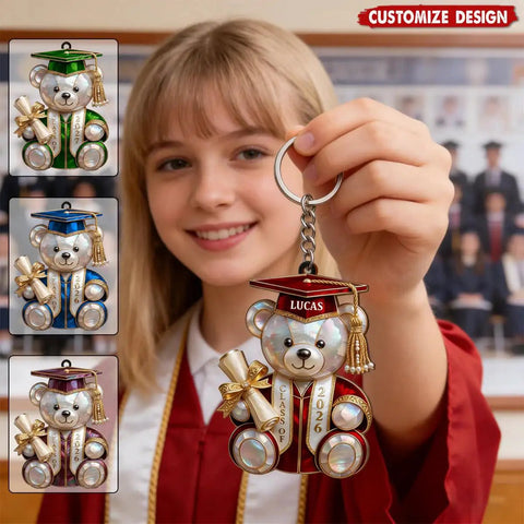 Graduate holding Personalized Graduation Bear Keychain With Custom Name And Class Of 2026 Dope Design Heartfelt Keepsake