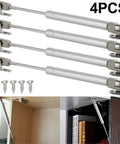 Heavy Duty Four Piece Gas Strut Cabinet Door Lift Support Kit With Pneumatic Rod Hydraulic Spring Hinges For Kitchen Cupboard And Furniture Hardware In Silver Finish displayed with screws and installed in cabinetry.