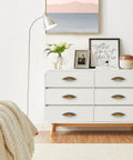 White dresser with Six Pack Antique Brass Cabinet Pulls Made From Zinc Alloy For Kitchen Drawers Dressers And Cupboards With Five And One Eighth Inch Total Length And Two And A Half Inch Center To Center Screw Spacing For Easy Installation And An Elegant Vintage Look in modern bedroom decor.
