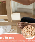 Person using 100 Pack Three Eighth Inch Wood Plugs For Screw Holes Mushroom Wood Button Round Head Covers on furniture