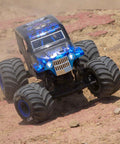 1 By 18 Scale Mini LMT Son Uva Digger 2S 4X4 RTR Brushed Monster Truck Blue in action on dirt terrain