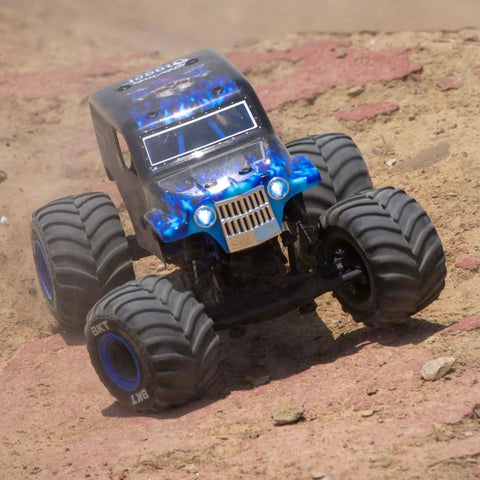 1 By 18 Scale Mini LMT Son Uva Digger 2S 4X4 RTR Brushed Monster Truck Blue in action on dirt terrain